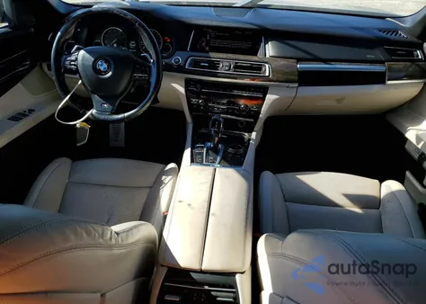 2015 BMW 750 I z USA, uszkodzony, nr VIN WBAYA8C58FD825448